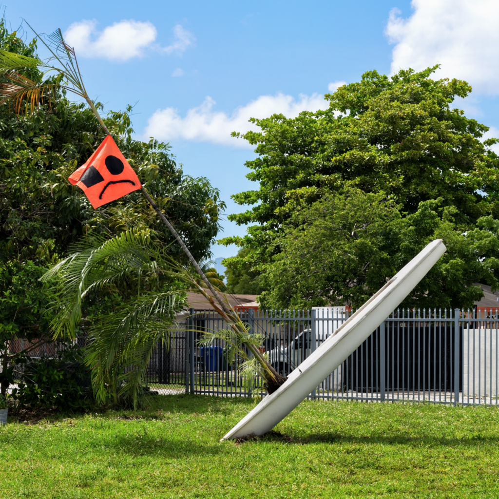Justin H. Long (b. 1980), SOS, 2025, fiberglass, palm tree, vinyl, spray paint, 168 x 216 x 48 in.